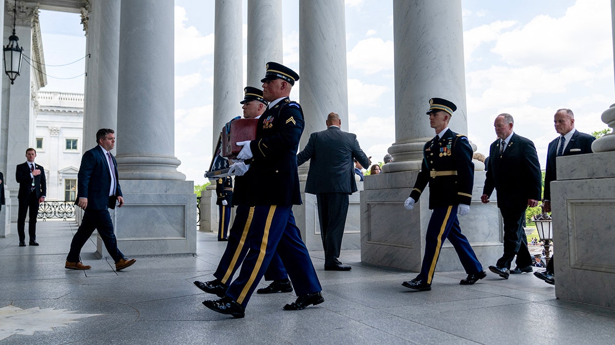 Urn of the late U.S. Army Col. Ralph Puckett arrives at US Capitol