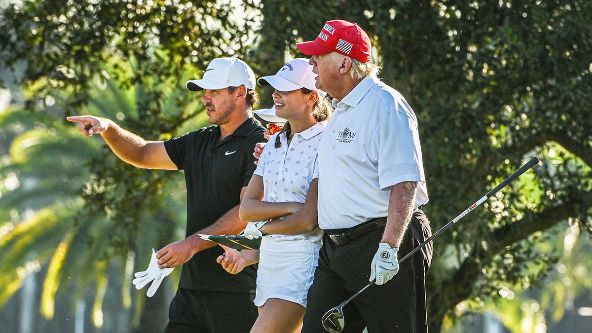 Trump and Kai golfing