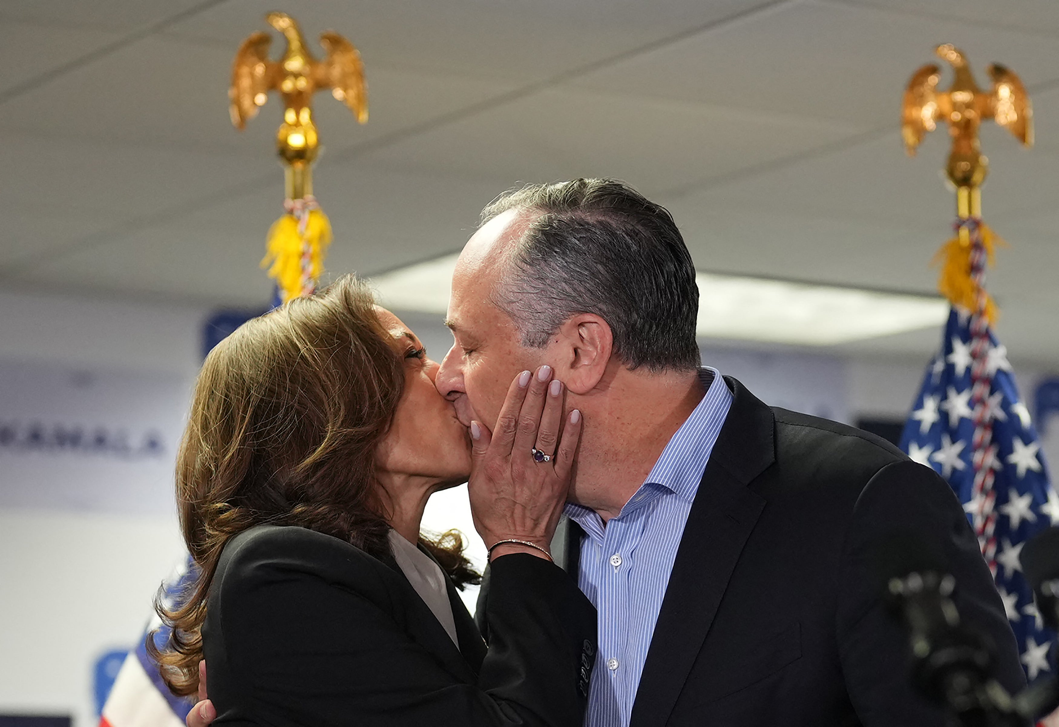 Harris and Emhoff kiss before Harris speaks at her campaign headquarters in Delaware on July 22. Emhoff later said that the vice president told him ‘I need you’ after learning that Joe Biden dropped out of the race.