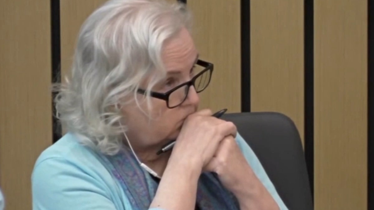 Nancy Crampton Brophy listens in court.