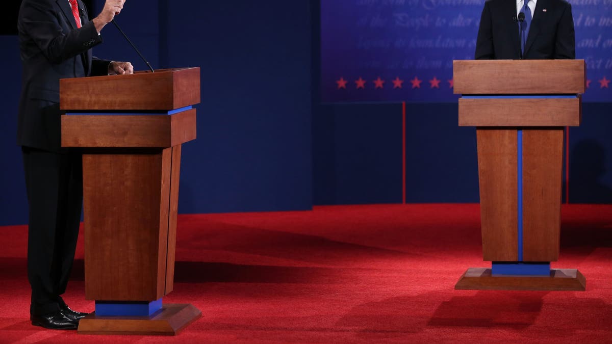 Mitt Romney, left, and Barack Obama, right, on debate stage