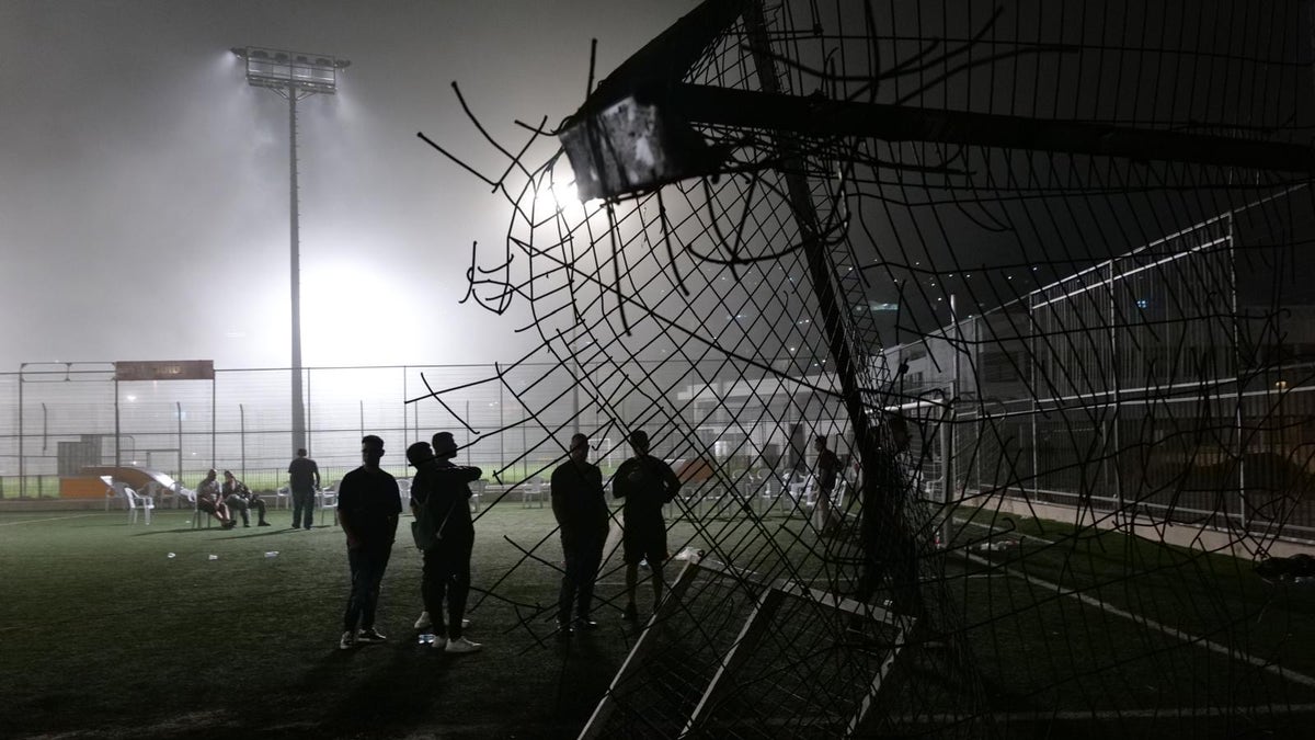 The scene of a deadly Hezbollah rocket strike on a soccer field in the Israeli Druze village of Majdal Shams on July 28, 2024. The strike killed 12 and injured more than 30, with most of the casualties between the ages of 10-20.