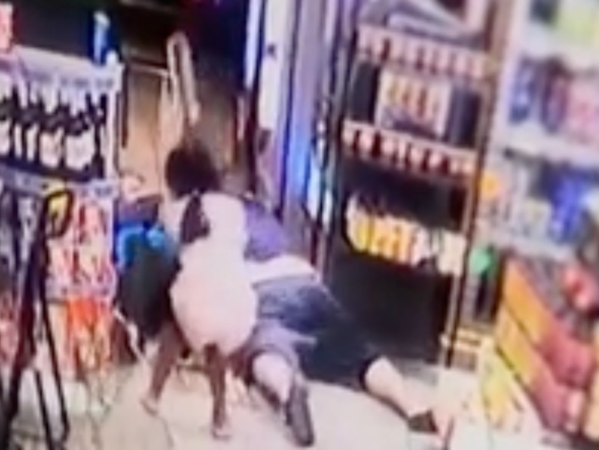 An eight-year-old girl beat an armed robber with a baseball bat who entered her dad’s liquor store and the incident was caught on film.