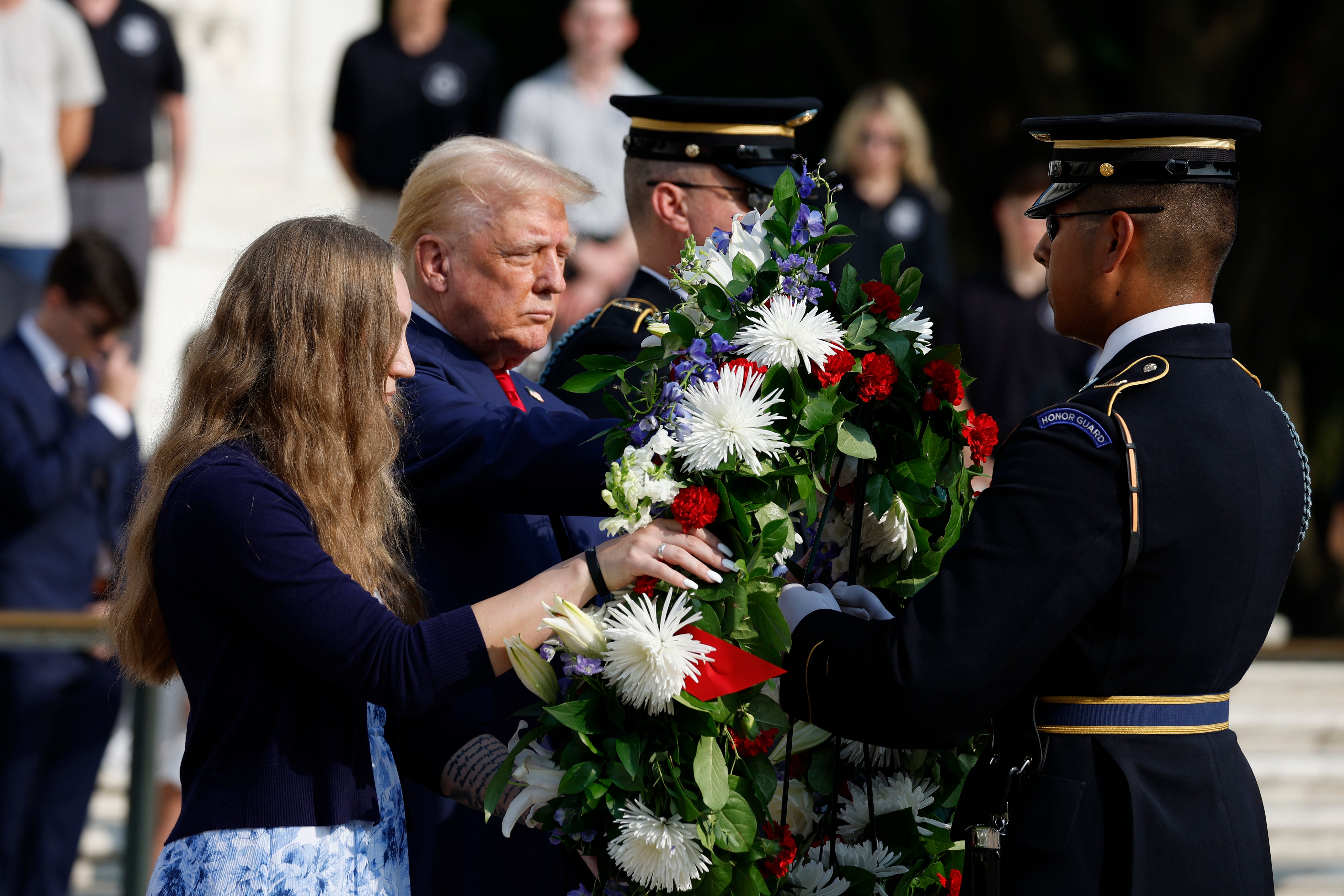 Donald Trump attending a wreath laying ceremony at the at Arlington National Cemetery on Monday