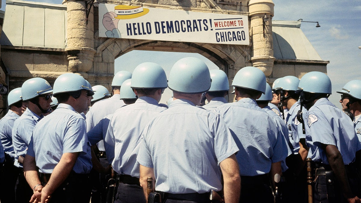 Riot police gathered outside the Democratic National Convention at the International Amphitheatre in Chicago