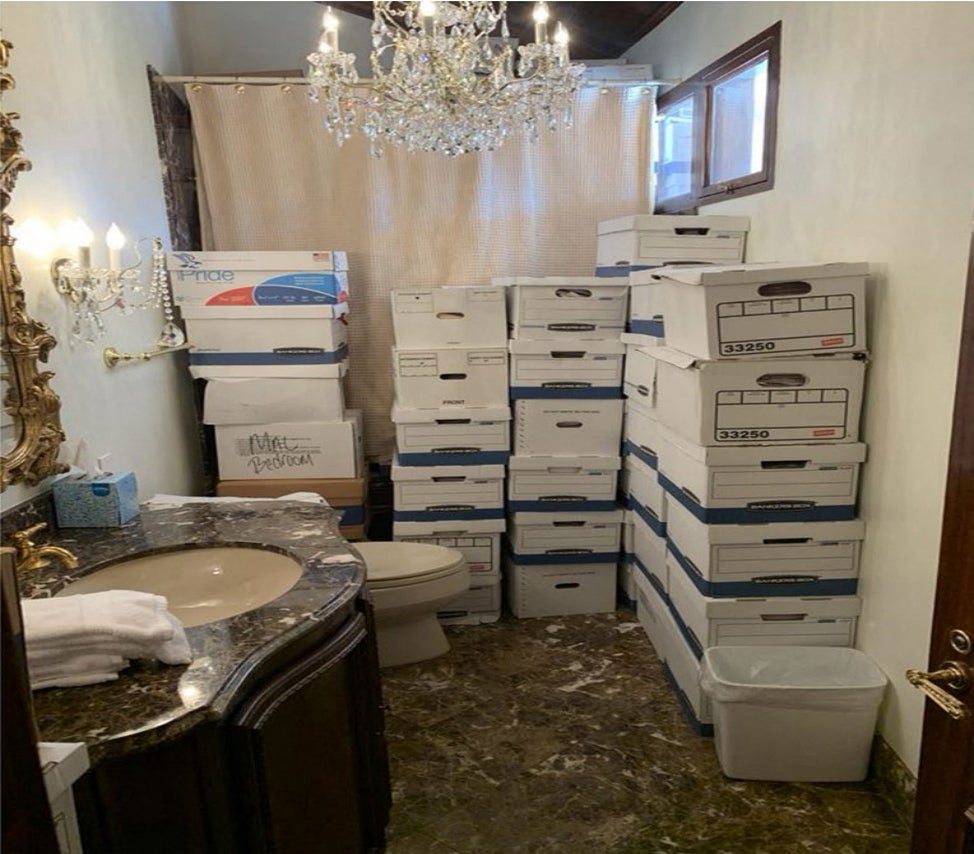 An undated image — released by the US District Court Southern District of Florida, and attached as evidence in the indictment against Donald Trump — shows stacks of boxes in a bathroom and shower at Mar-a-Lago, the former president’s private club