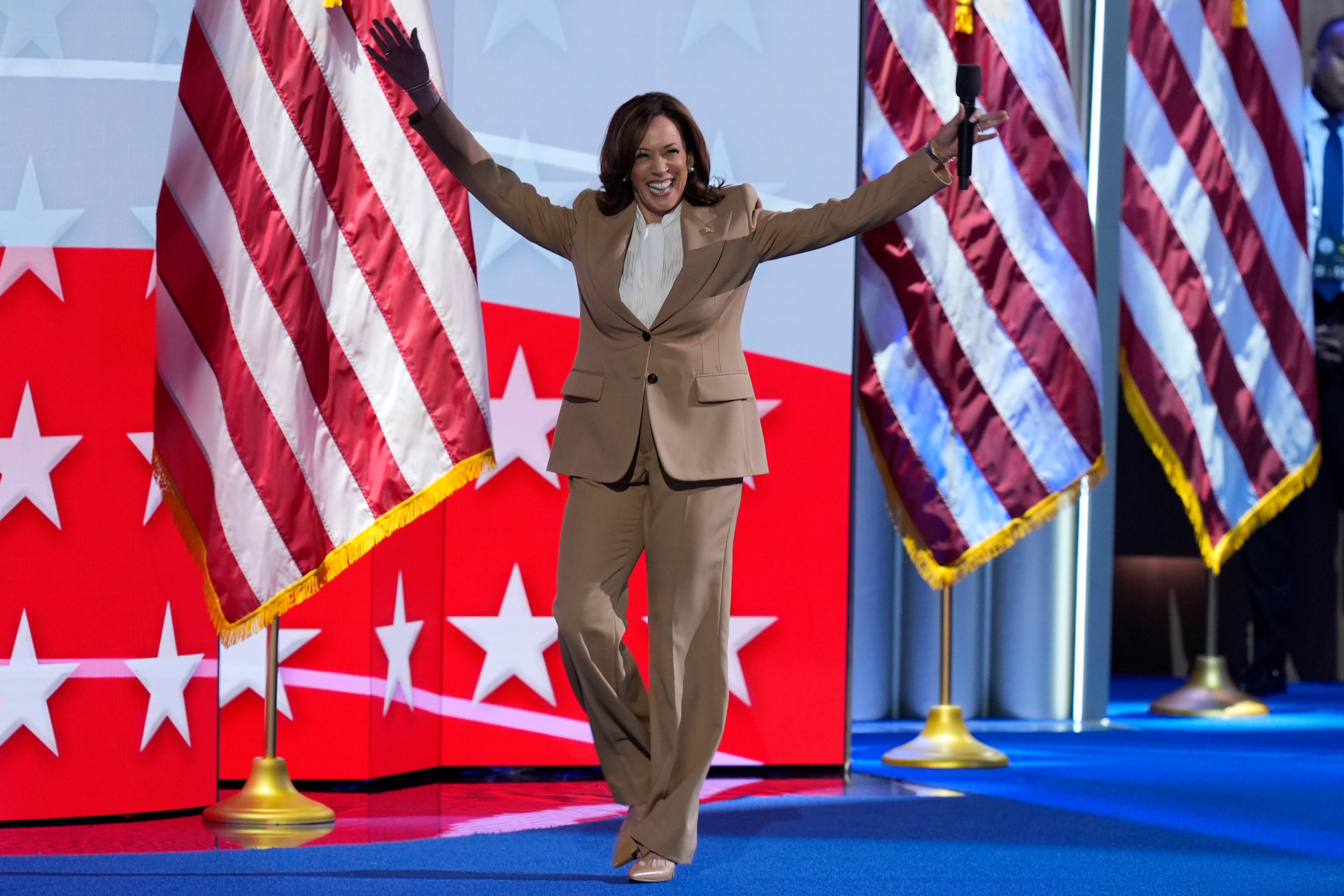 Kamala Harris steps out for a surprise appearance at the Democratic National Convention in Chicago on August 19.