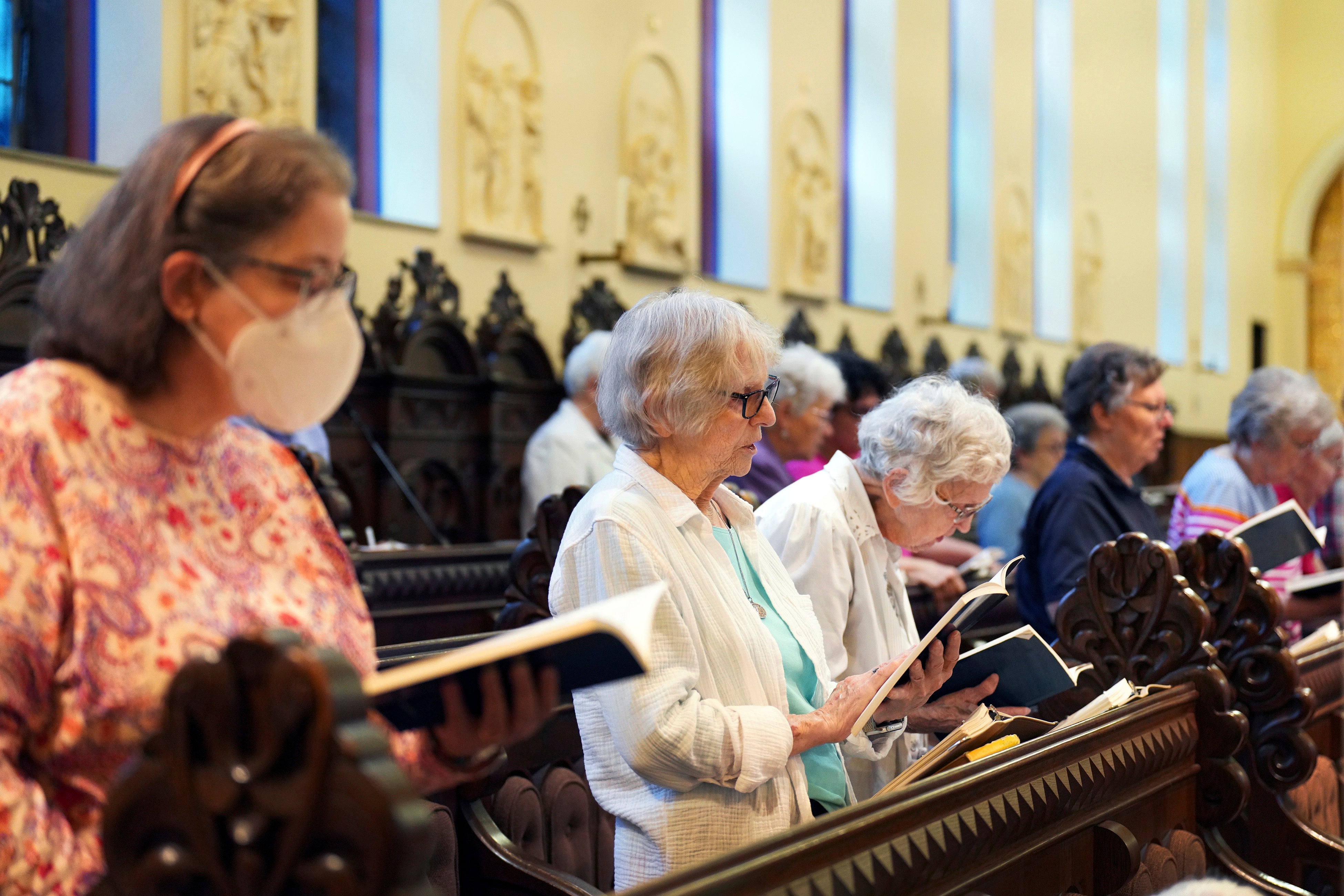 Benedictine sisters join in song during evening prayer at the Mount St. Scholastica monastery in Atchison