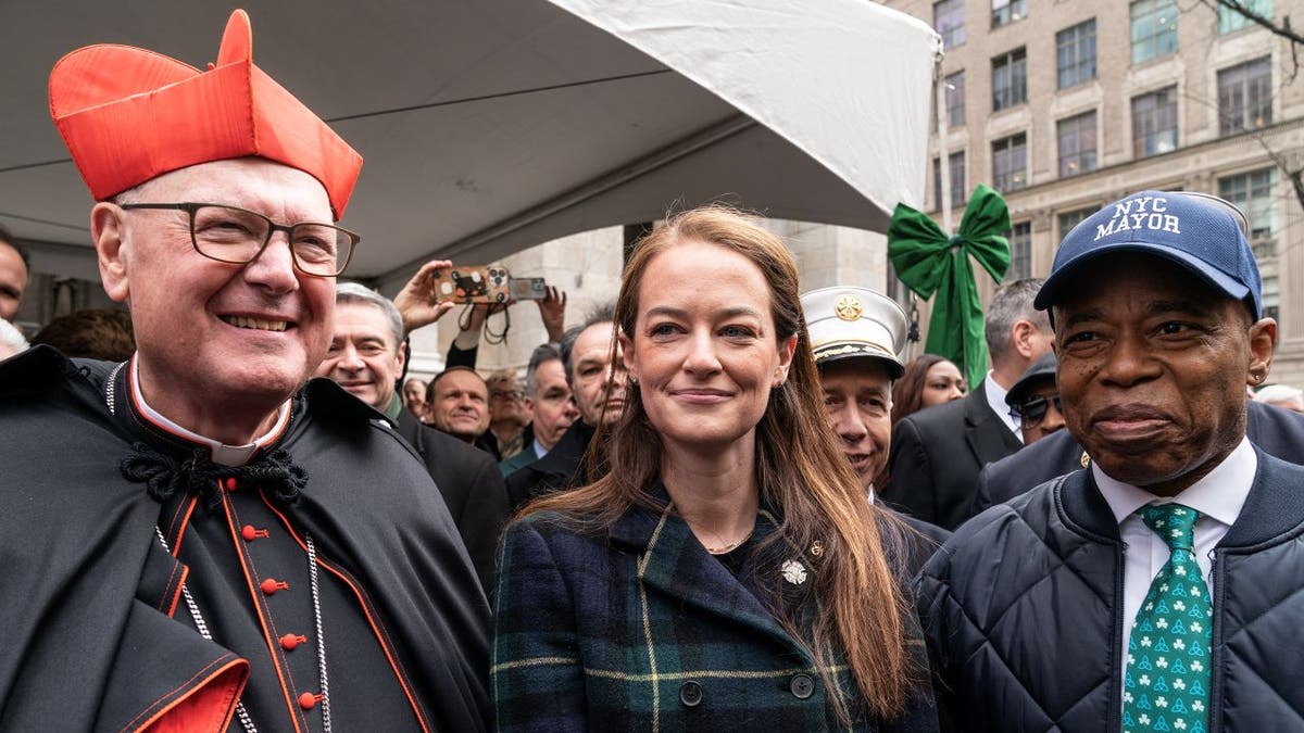 Laura Kavanagh poses with Cardinal Timothy Dolan and Mayor Eric Adams