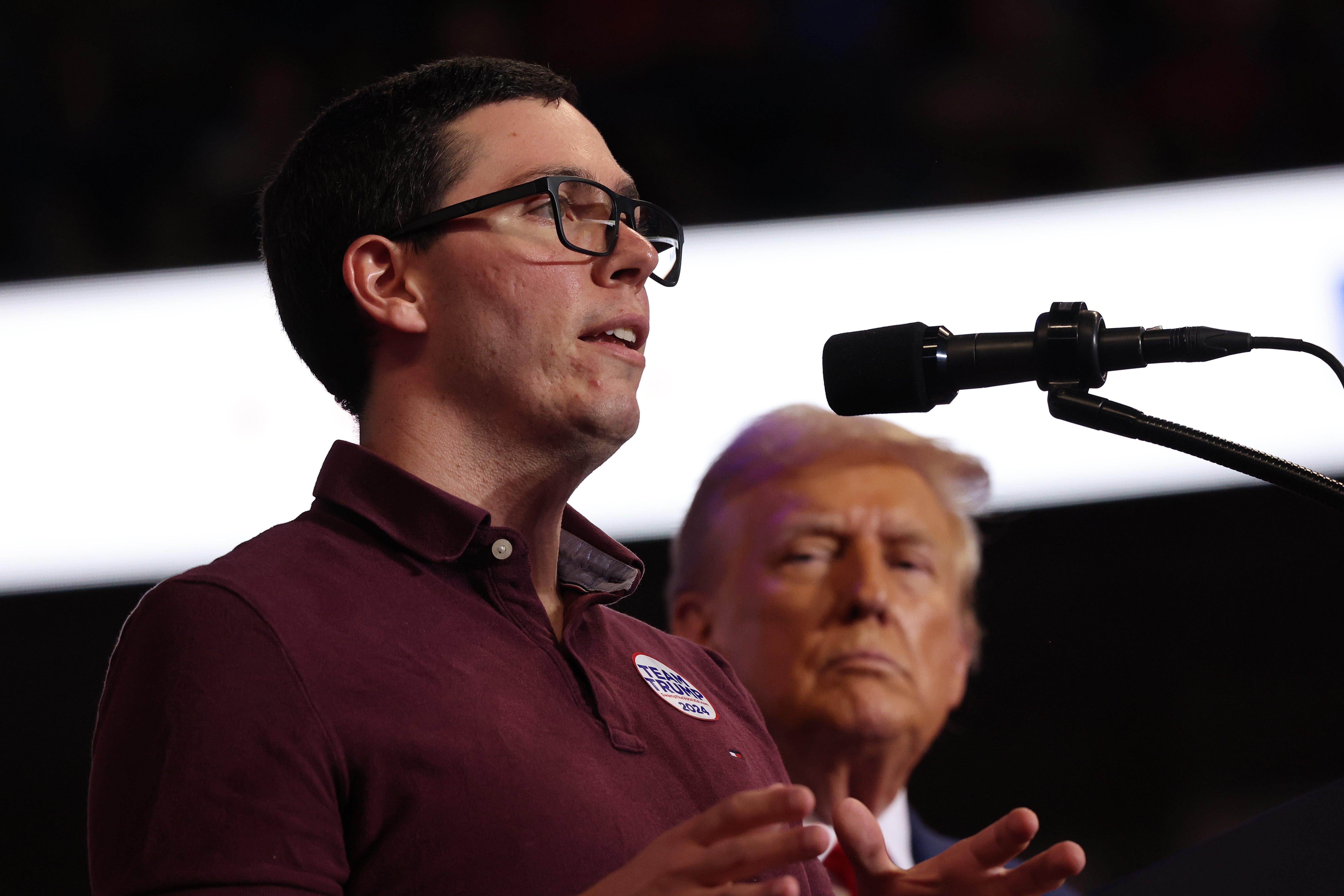 Republican Presidential Candidate former U.S. President Donald Trump watches as Daniel Campos speaks about his life in Venezuela during a campaign rally at Mohegan Sun Arena at Casey Plaza on August 17, 2024 in Wilkes Barre, Pennsylvania