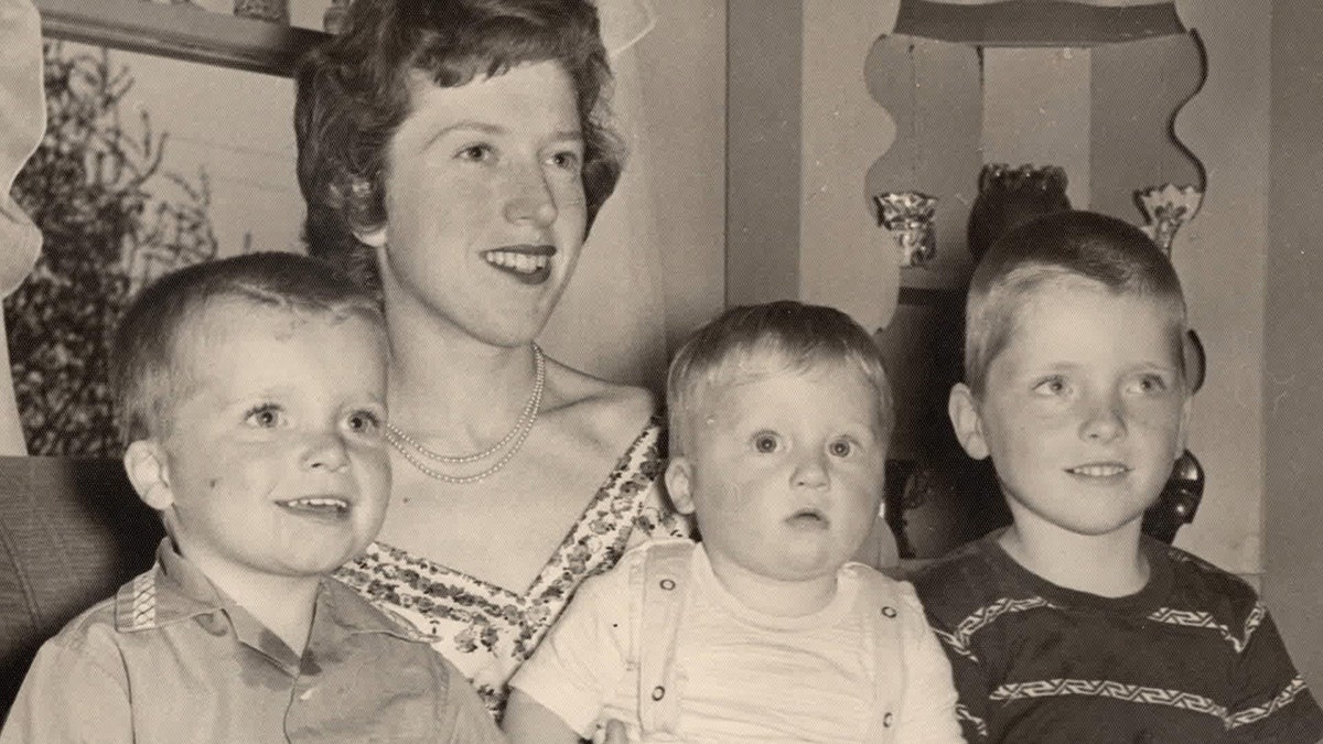 Hadden Clark with his brothers and their mother in a family portrait.