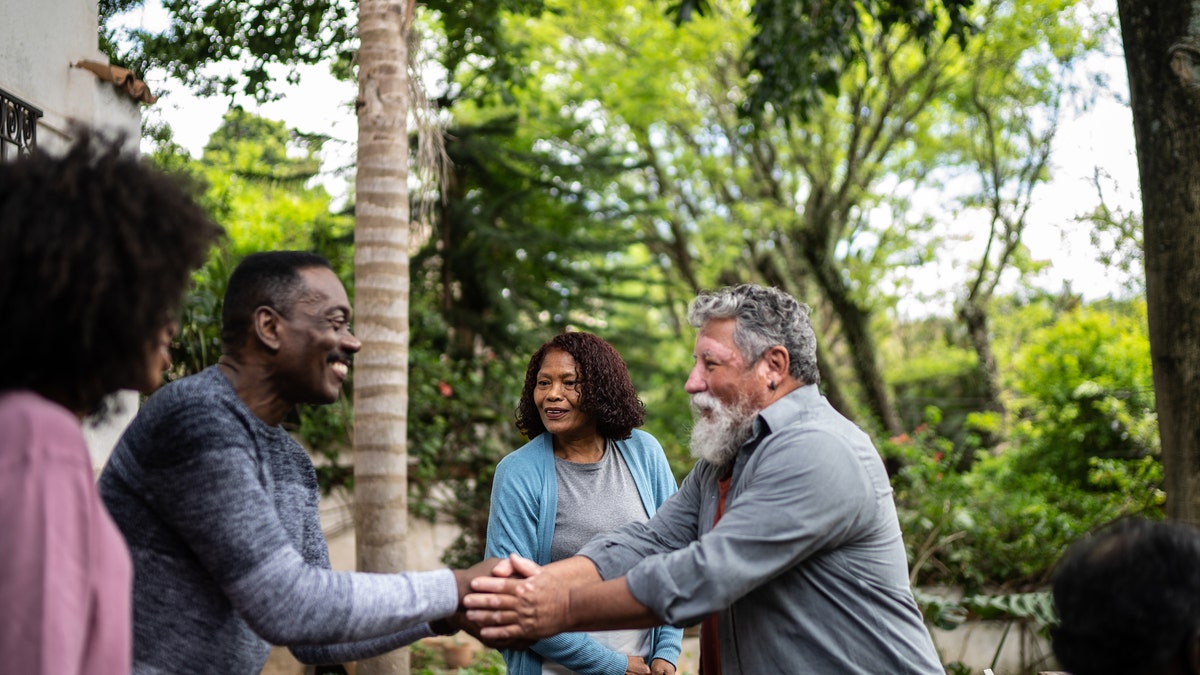 Neighbors greeting each other