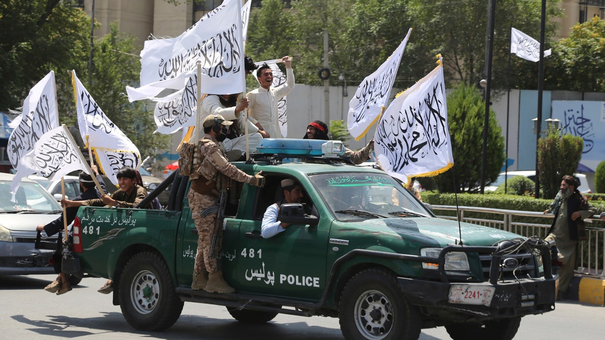 Afghan Taliban on pickup truck