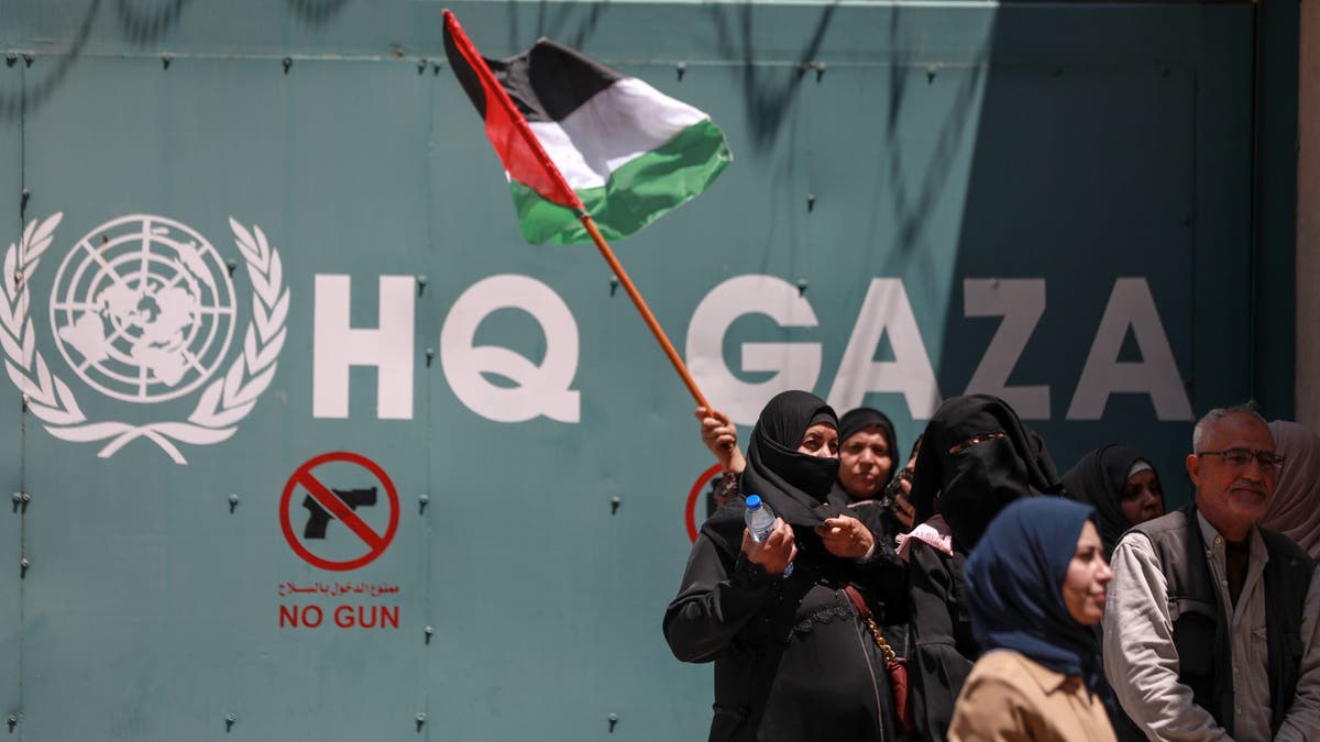 Palestinians protest outside the United Nations Relief and Works Agency in Gaza City against the reduction of food aid provided for the refugees on June 20, 2023.