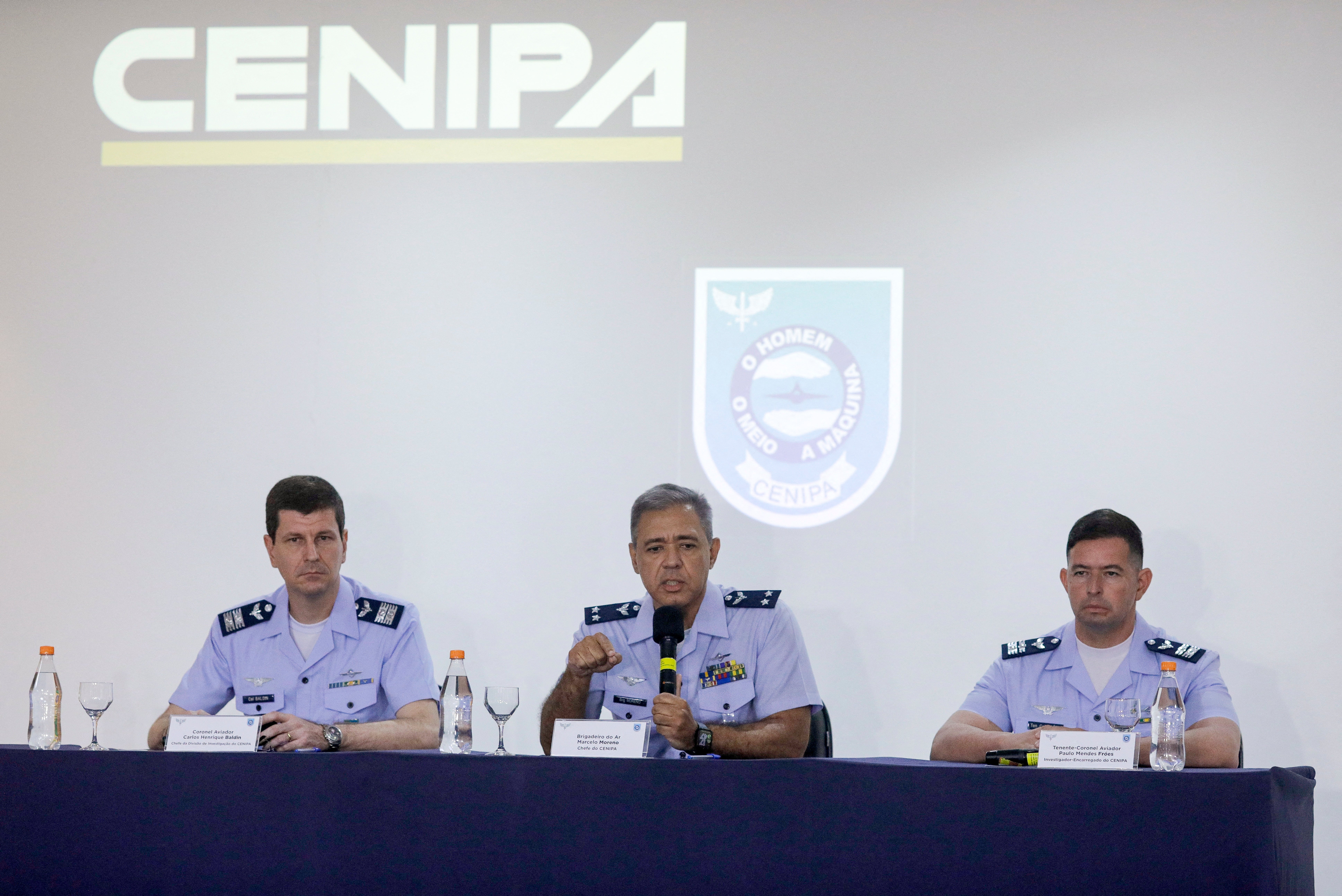 Colonel Carlos Baldin, chief of investigation at the Air Accident Investigation and Prevention Center (Cenipa), Brigadier General Marcelo Moreno, and Lieutenant Colonel Paulo Mendes Froes attend a press conference on the crash of the Voepass plane early August, in Brasilia on 6 September 2024