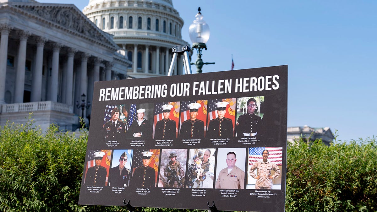 pics of 13 fallen service members in front of Capitol