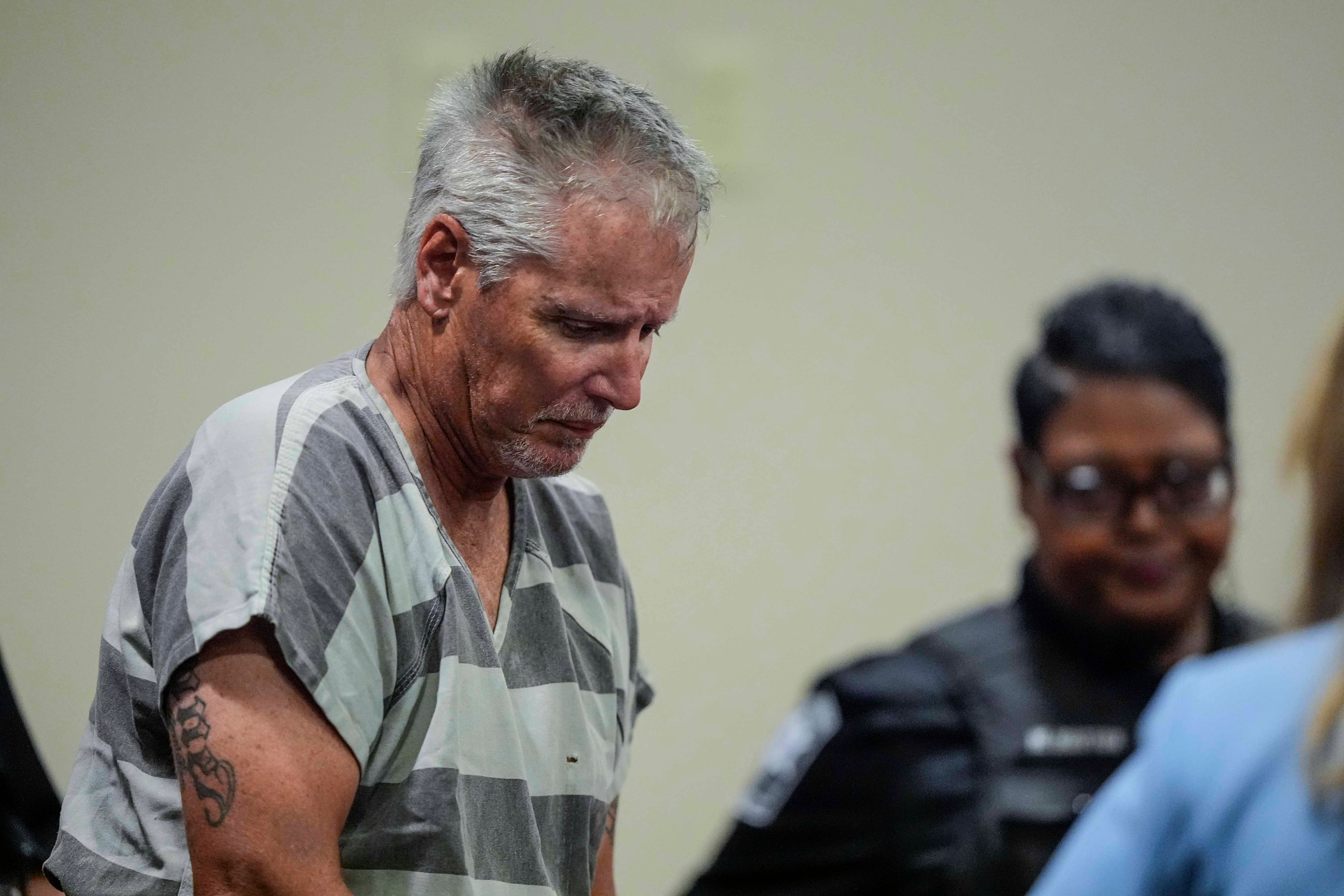 Colin Gray, 54, enters the Barrow County courthouse for his first appearance, on Friday, September 6