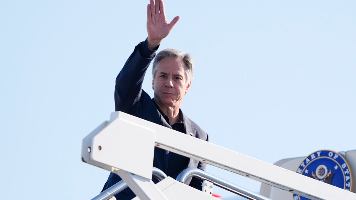 U.S. Secretary of State Antony Blinken boards a plane for London, Monday, at Joint Base Andrews, Maryland.