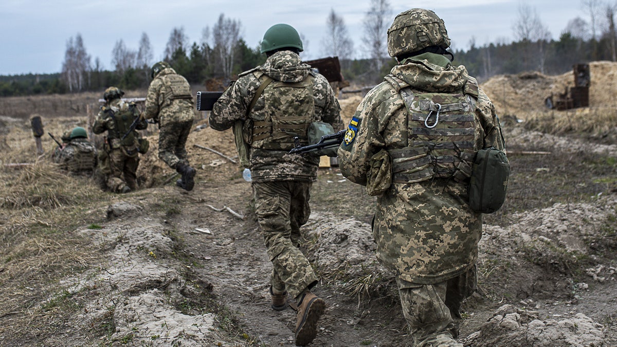 Battalion 120 territorial defense takes part in training exercises near the Belarus border in Chernobyl, Ukraine, on March 16, 2024 as the war between Russia and Ukraine has been going on for the last two years.