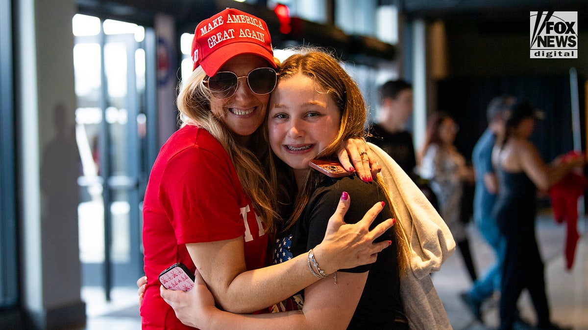 Attendees enter former President Donald Trump’s rally in Uniondale, New York