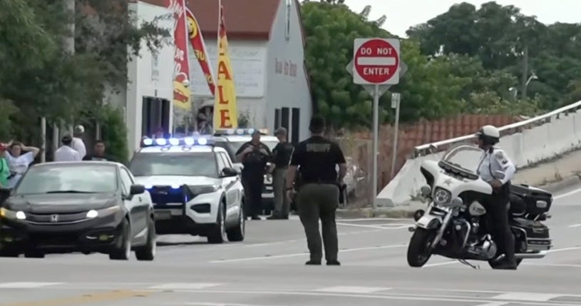 Law enforcement on the scene close to Trump’s golf club in West Palm Beach, Florida, after shots were fired