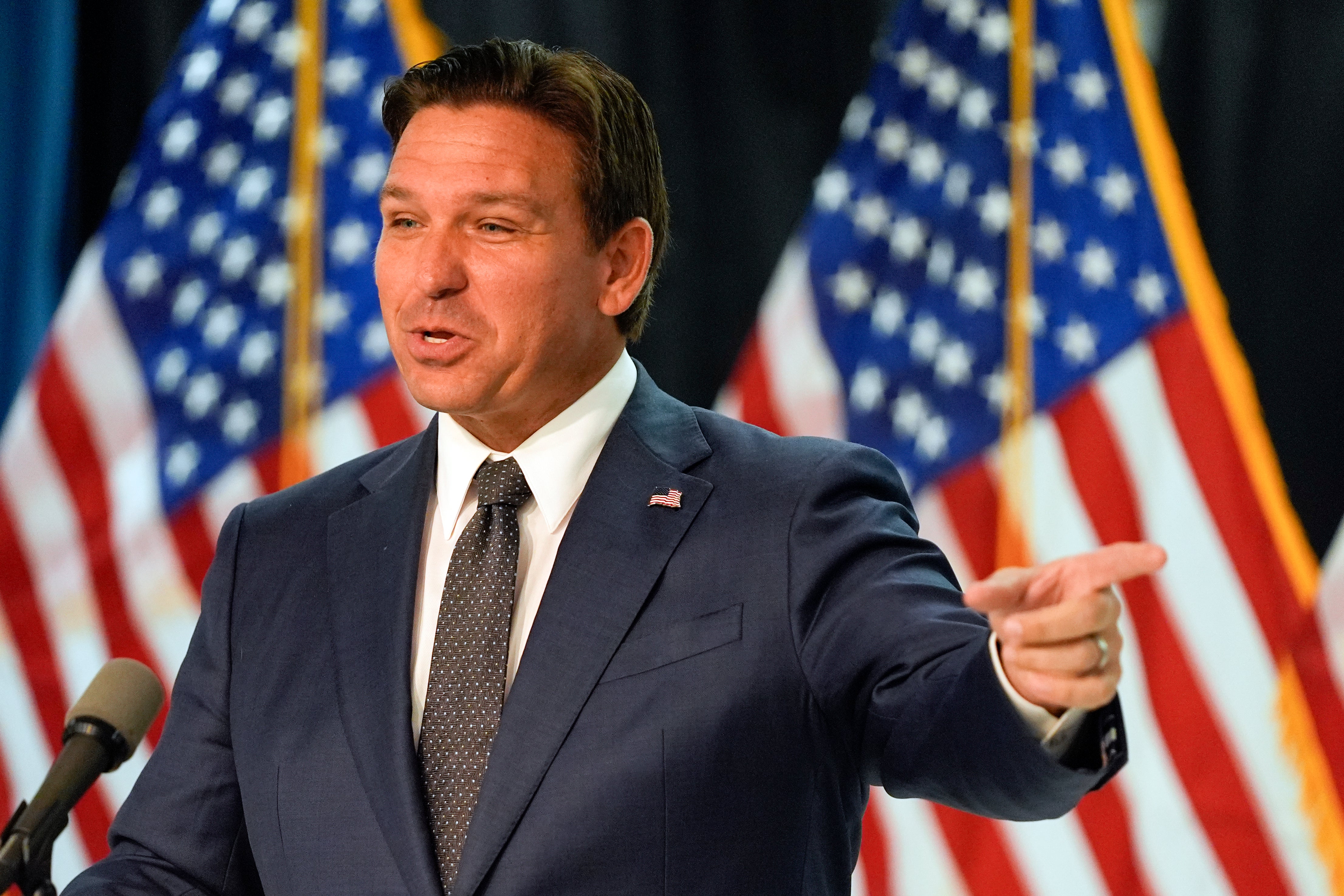 Ron DeSantis delivers remarks and answers questions at a news conference on Monday in Orlando, Florida