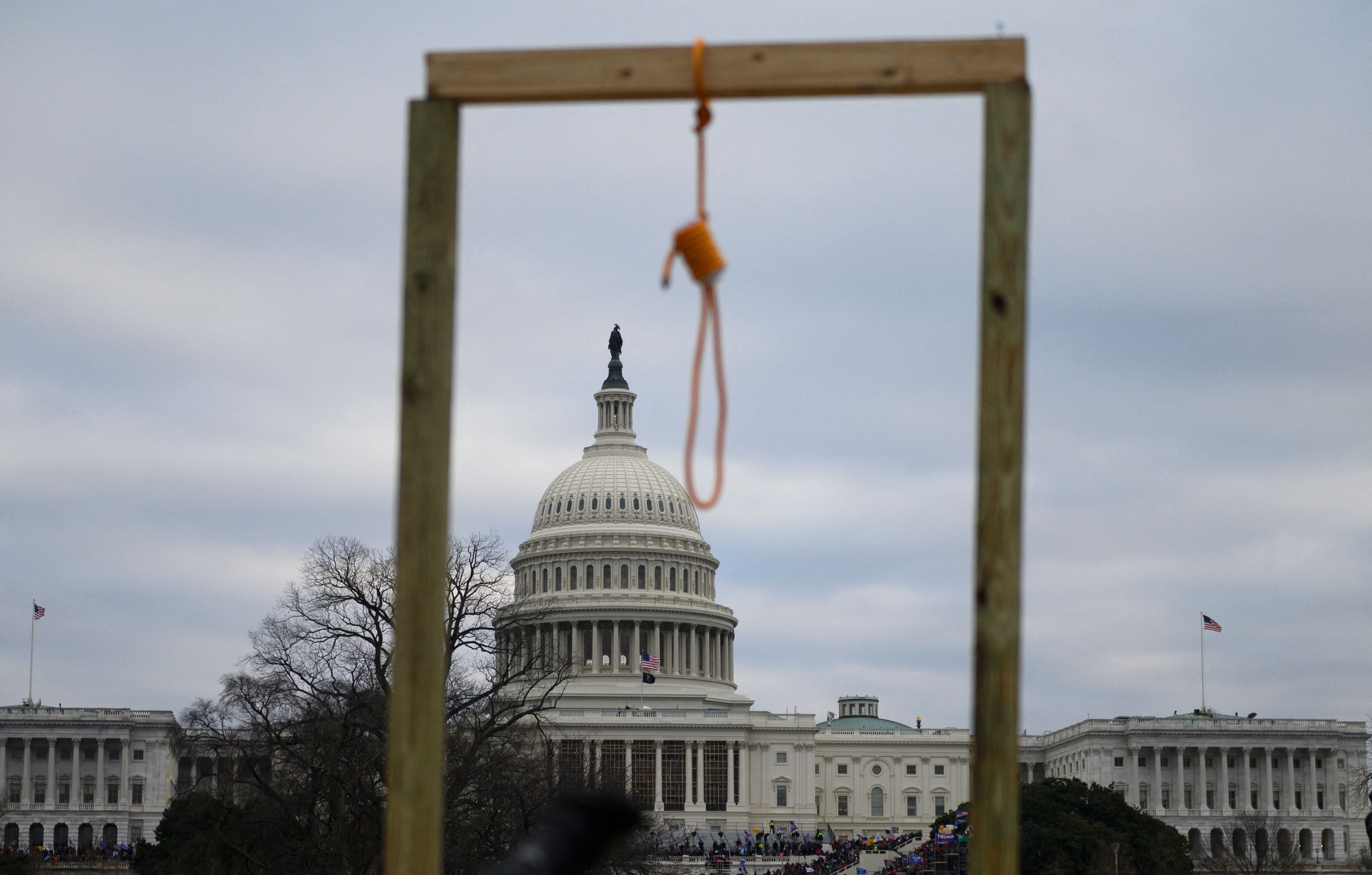 A noose is seen on makeshift gallows outside the US Capitol on January 6, 2021