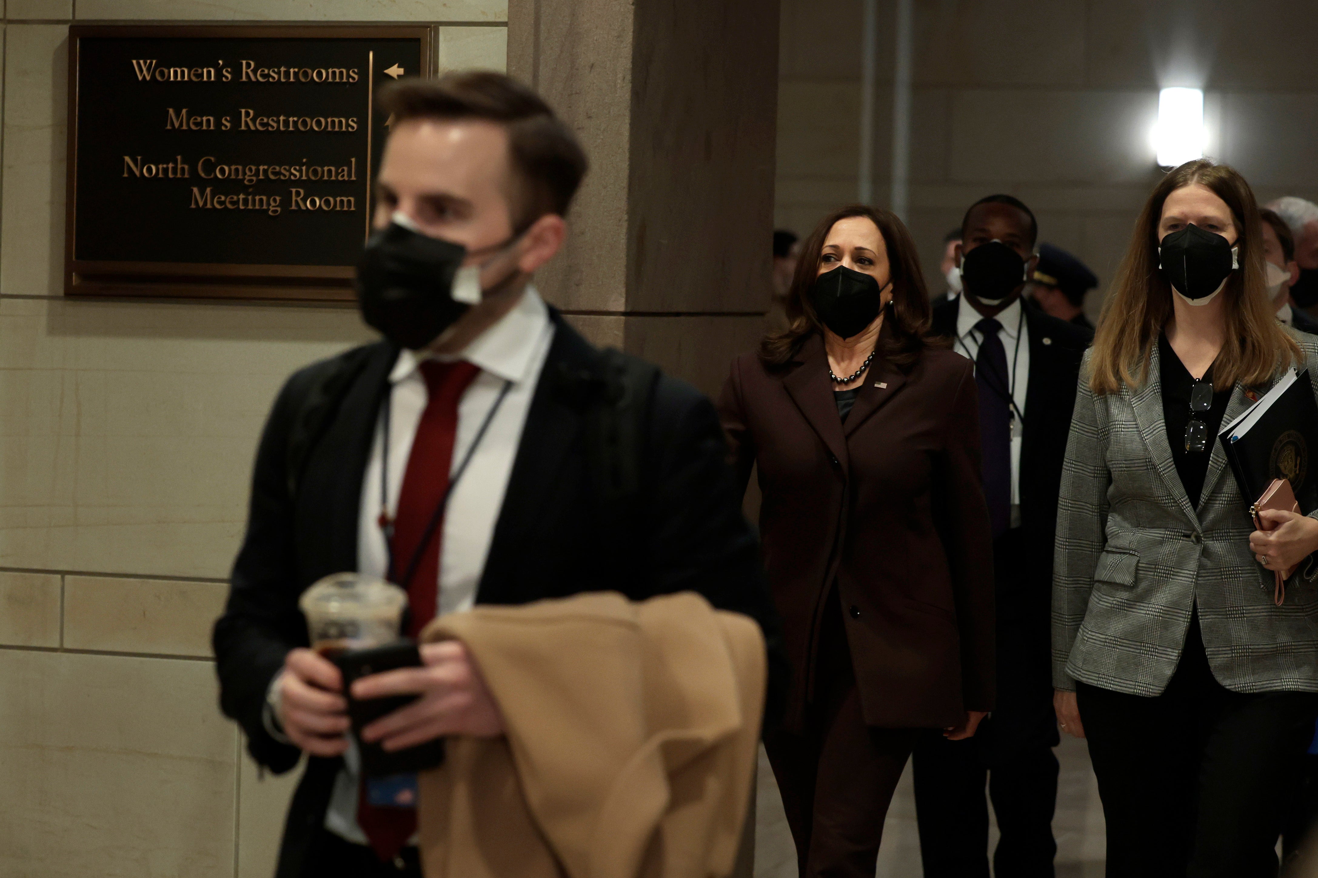 Vice President Kamala Harris walks alongside aides and staffer in 2022. She lost numerous staff members when she first took the office as concerns about her management style arose