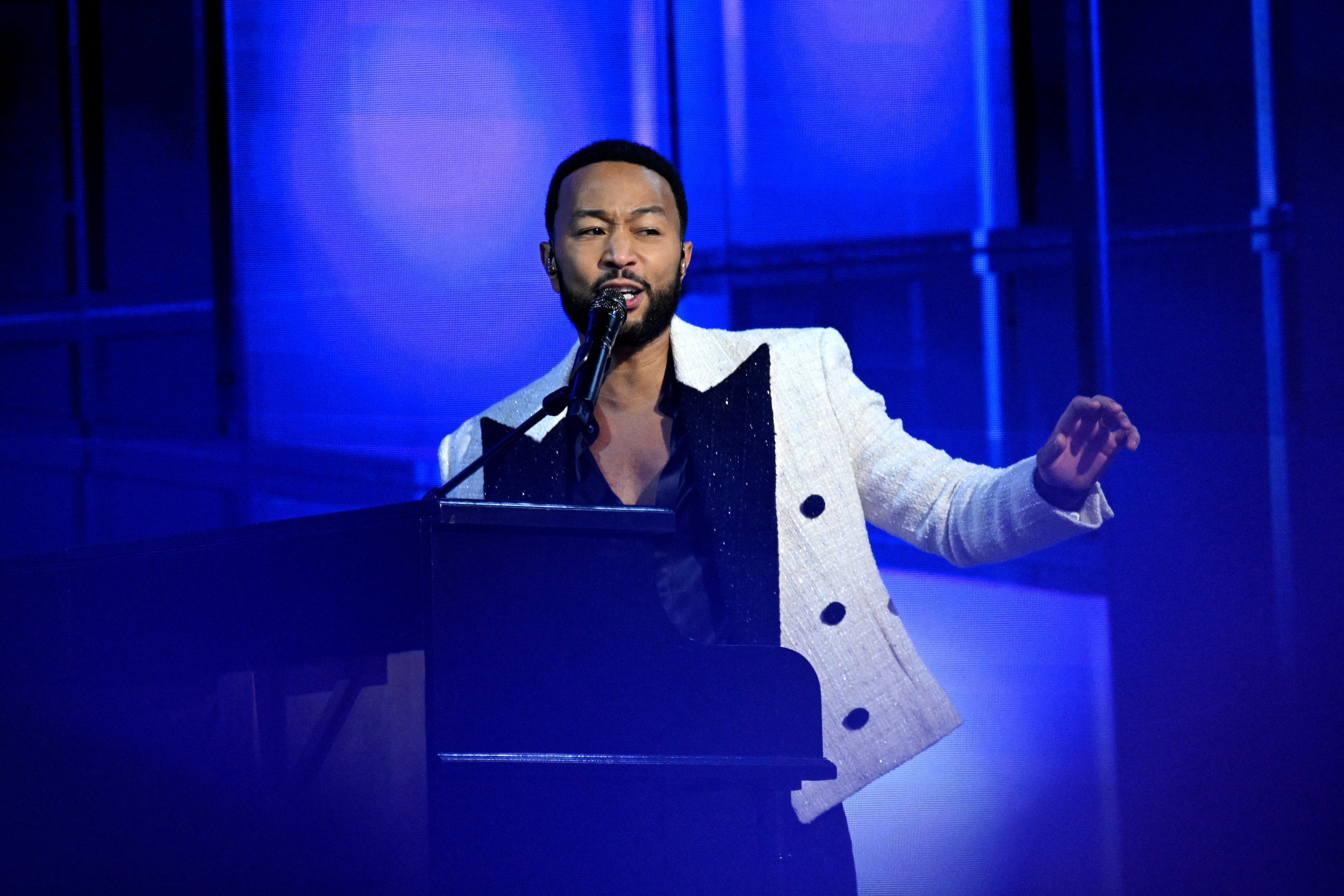 John Legend performs at the 2024 Democratic National Convention. The award-winning singer will attend a campaign event for Kamala Harris this afternoon