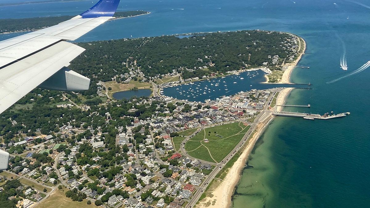 Aerial view of Oak Bluffs, Massachusetts on the resort island of Martha's Vineyard. Oak Bluffs is famous for charming gingerbread houses, small harbor and, like all of Martha's Vineyard extraordinarily high costs of real estate and living.