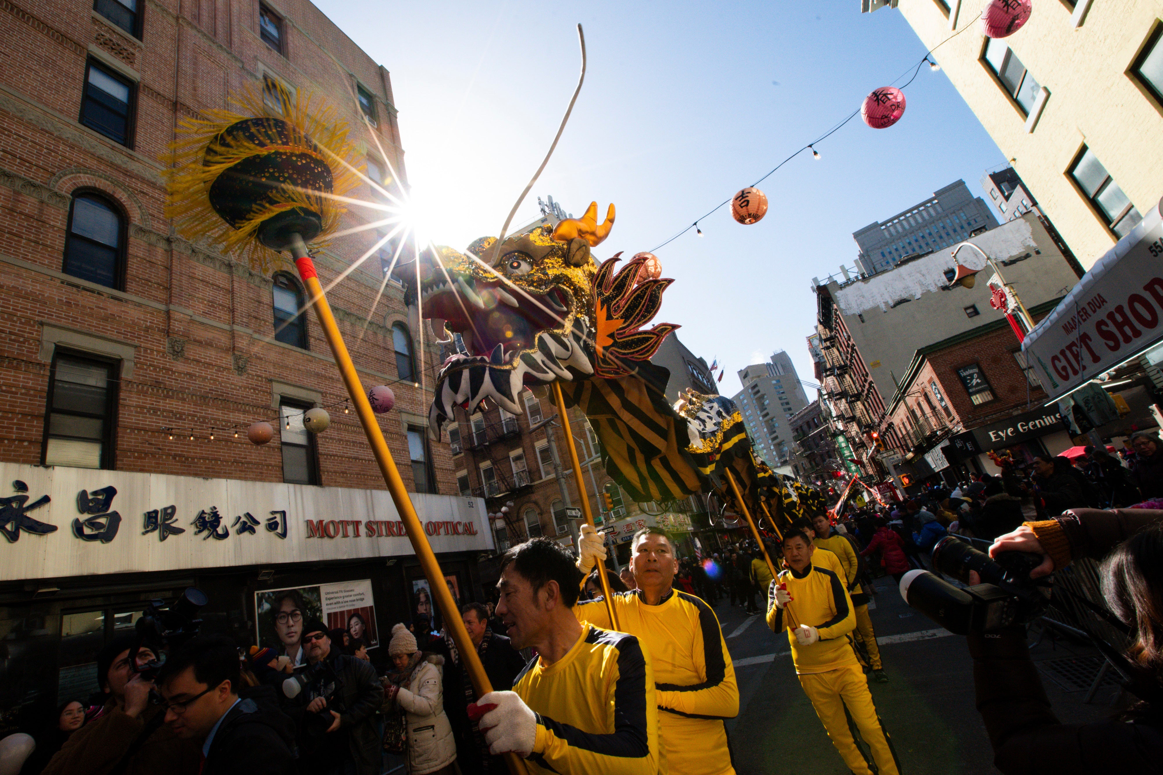 Revelers gather to attend the parade for the Chinese New Year “The Dragon” in the Chinatown neighborhood of Manhattan