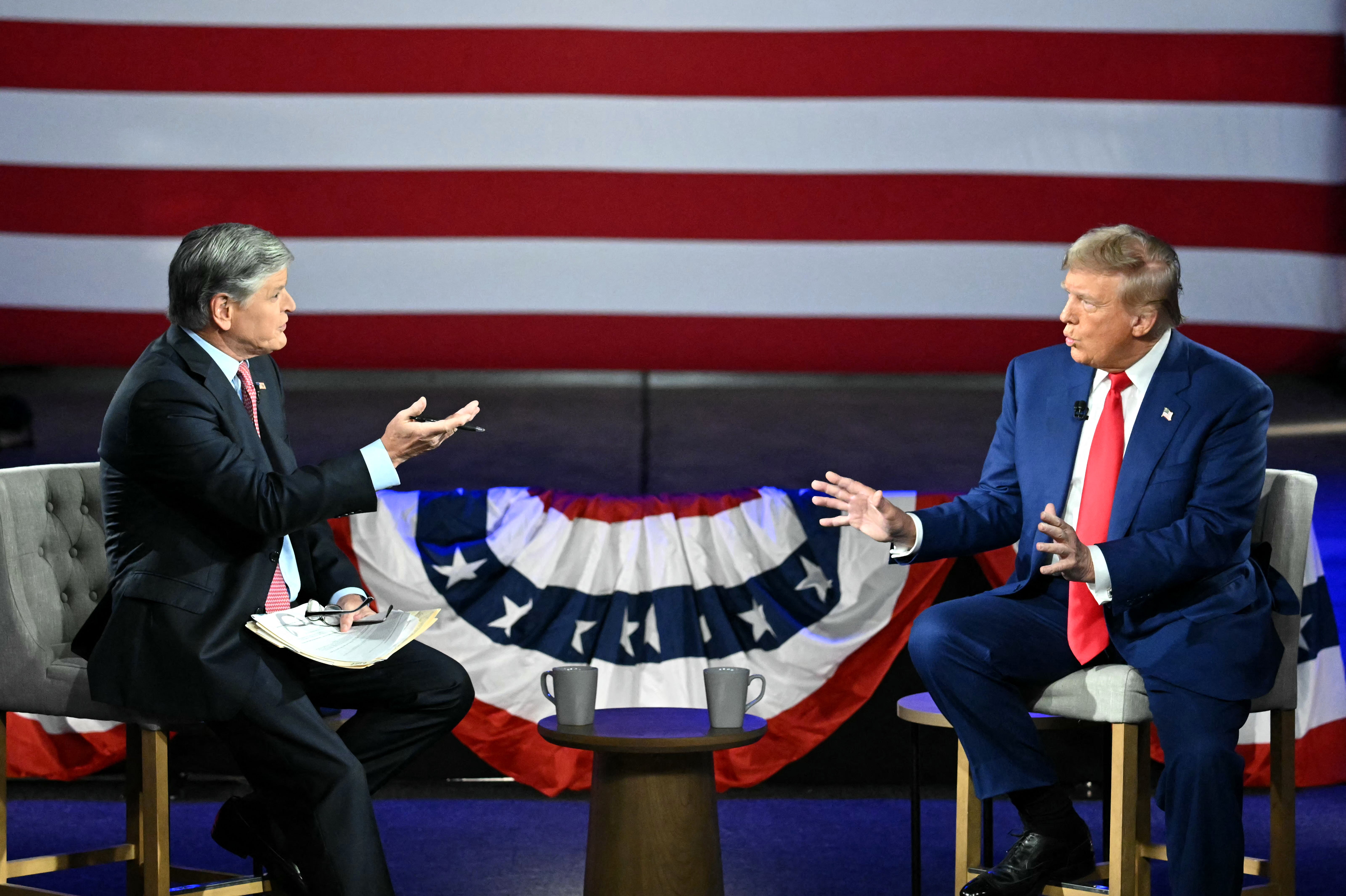 Donald Trump and Sean Hannity at a pre-recorded town hall in Pennsylvania which aired Wednesday on Fox News