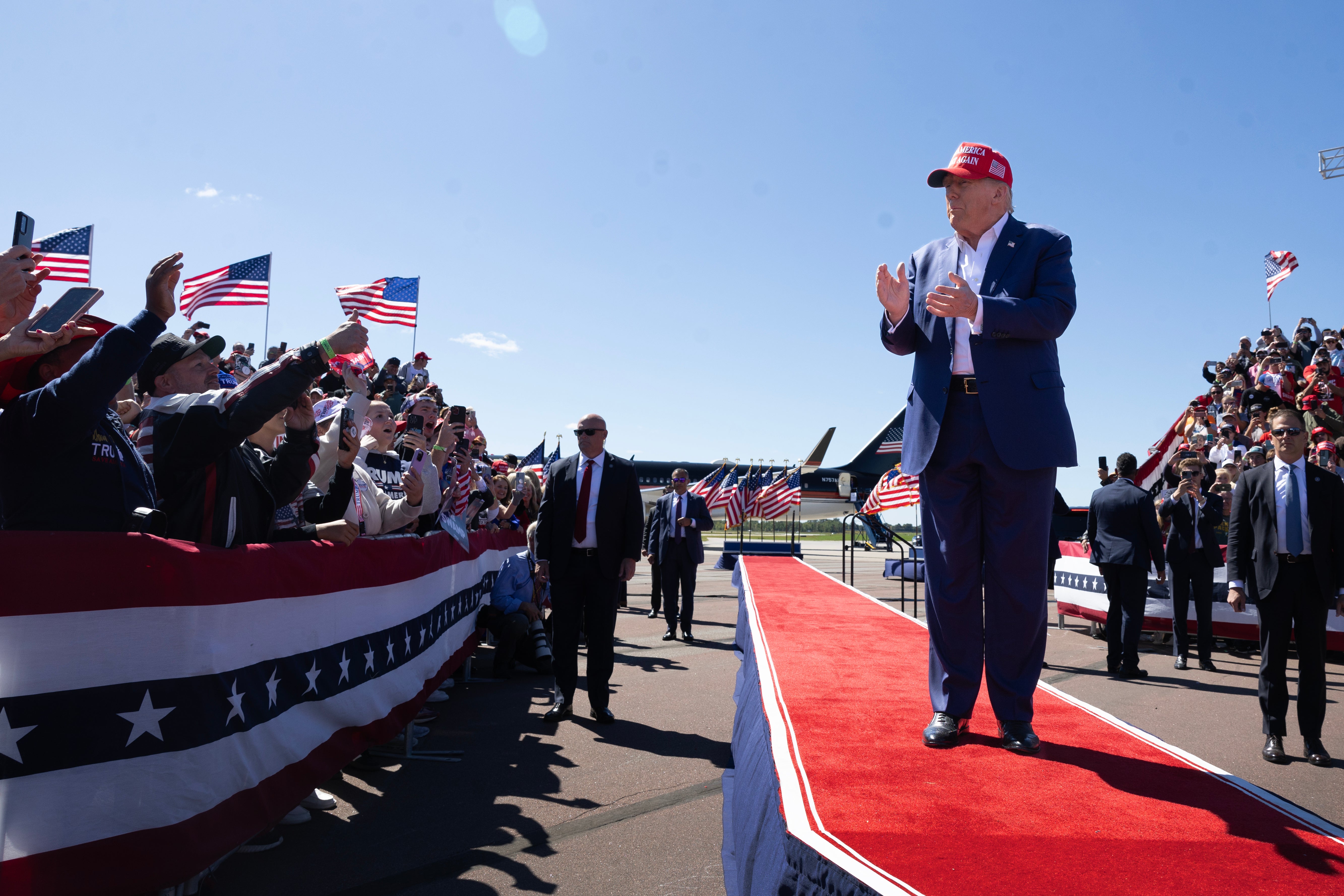 Republican presidential nominee former President Donald Trump arrives for a campaign event at the Central Wisconsin Airport on September 07, 2024 in Mosinee, Wisconsin. Trump made a rambling speech in which he made baseless claims about gender operations