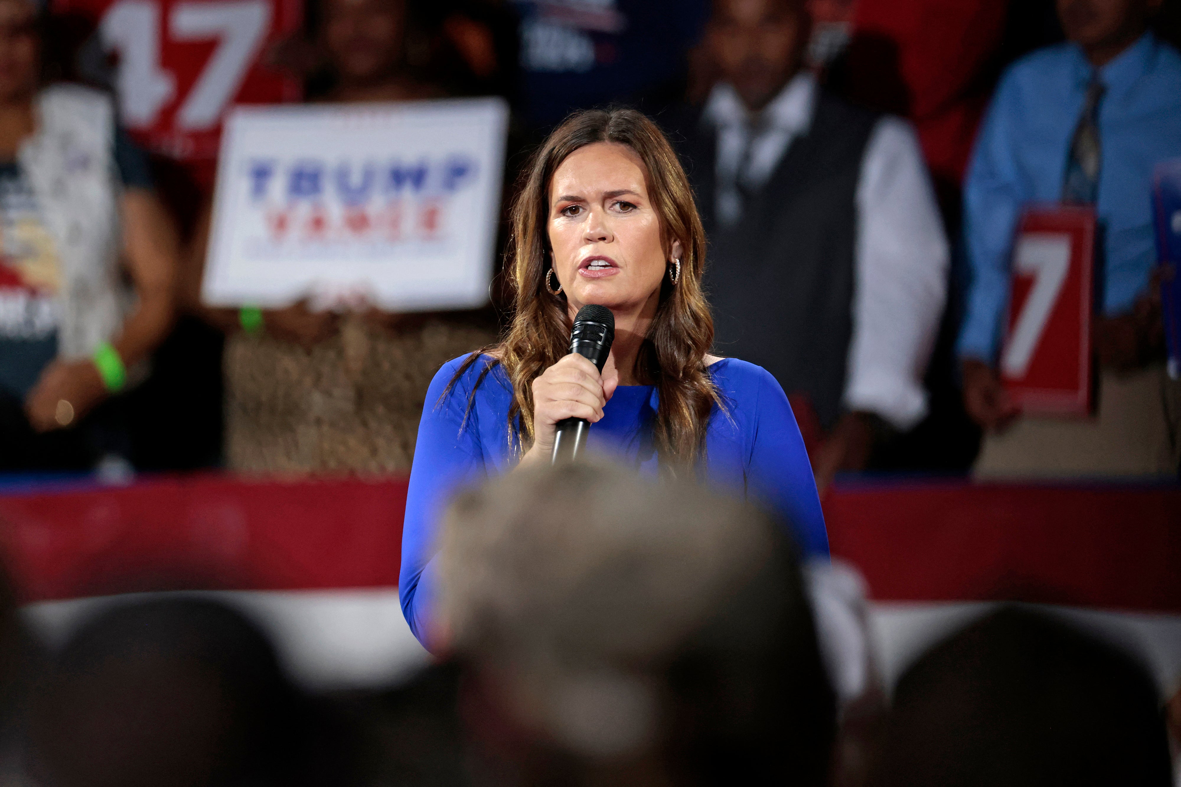 Sarah Huckabee Sanders made critical comments of Kamala Harris at a town hall with Donald Trump in Flint, Michigan