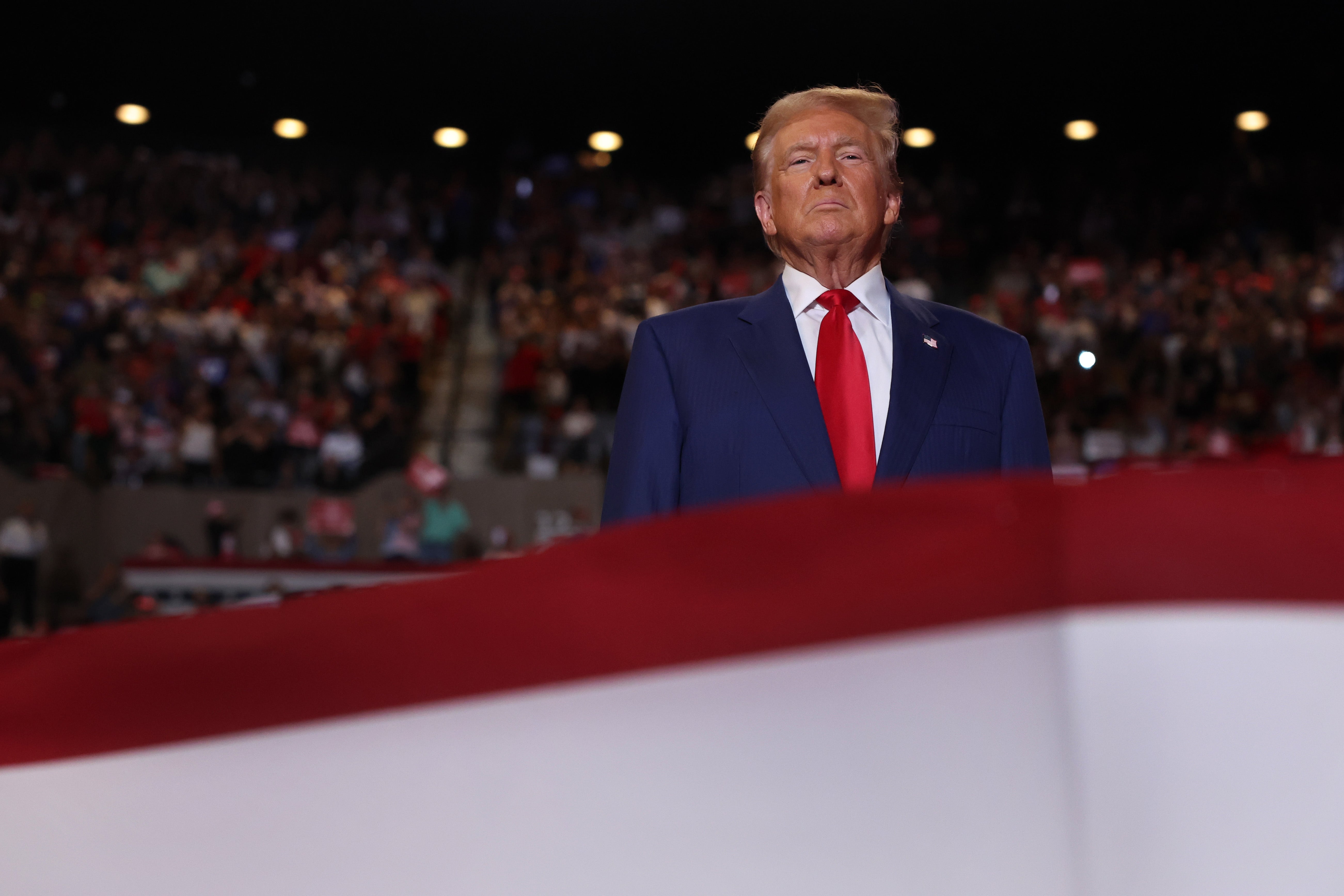 Donald Trump speaks at an evening rally in Uniondale on Long Island on September 18, 2024 in Uniondale, New York. Republican Governor of Ohio Mike DeWine said he was ‘saddenned’ by Trump and JD Vance’s refusal to step away from their baseless claims about Haitian migrants