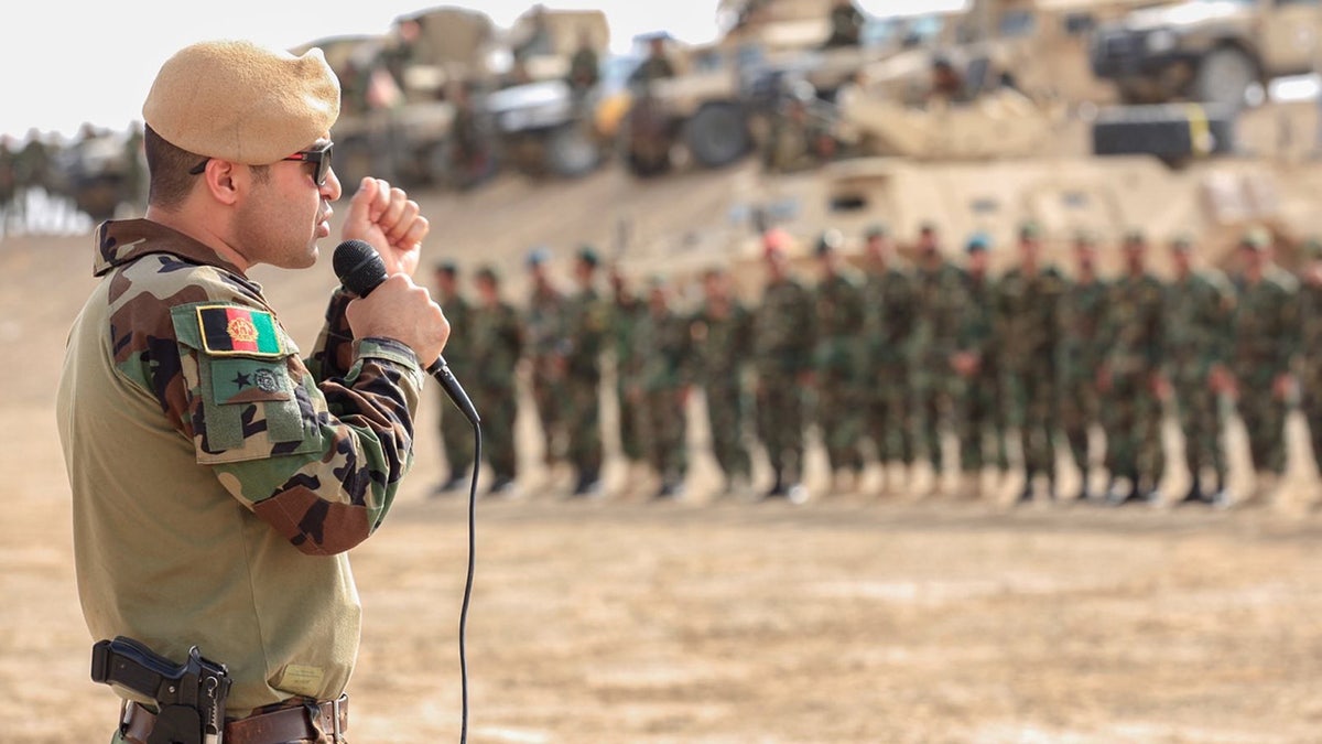 Former Afghan Lt. General Sami Sadat speaks to Afghan troops amid coordinated efforts to counter the Taliban with US forces.