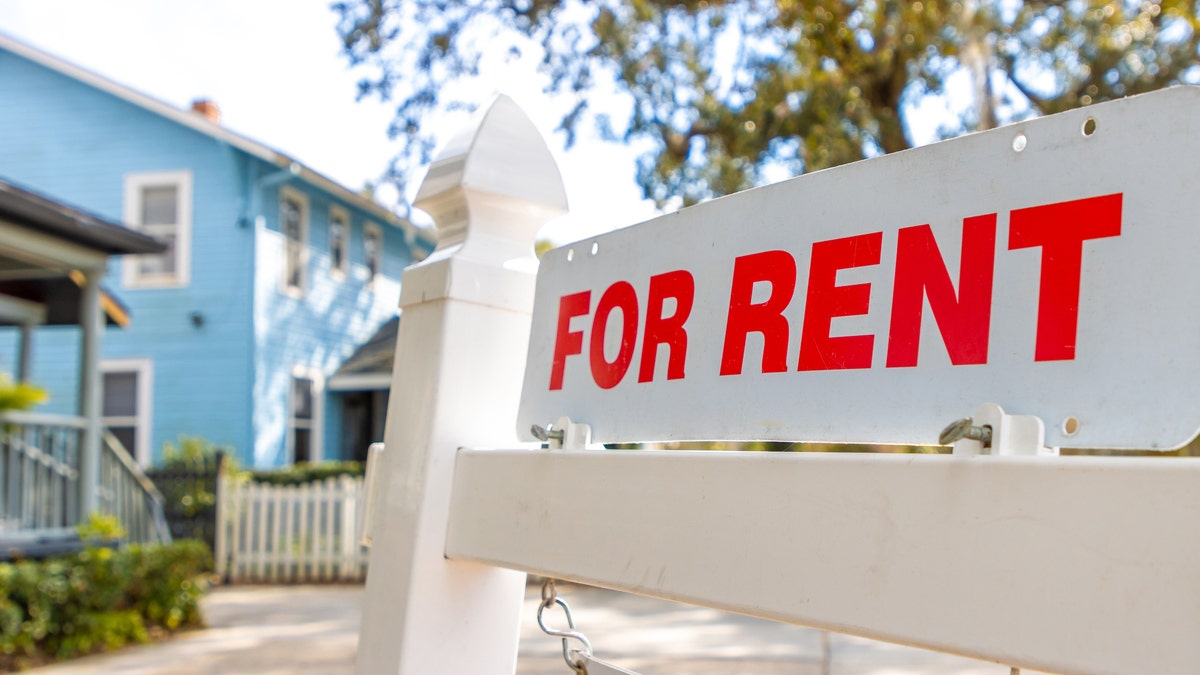 For rent sign in front of home