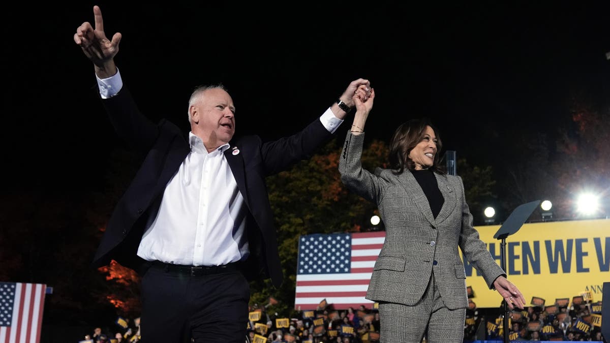 Democratic presidential nominee Vice President Kamala Harris and her running mate, Minnesota Gov. Tim Walz, depart after speaking during a campaign rally at Burns Park in Ann Arbor, Michigan, on Monday, Oct. 28, 2024.