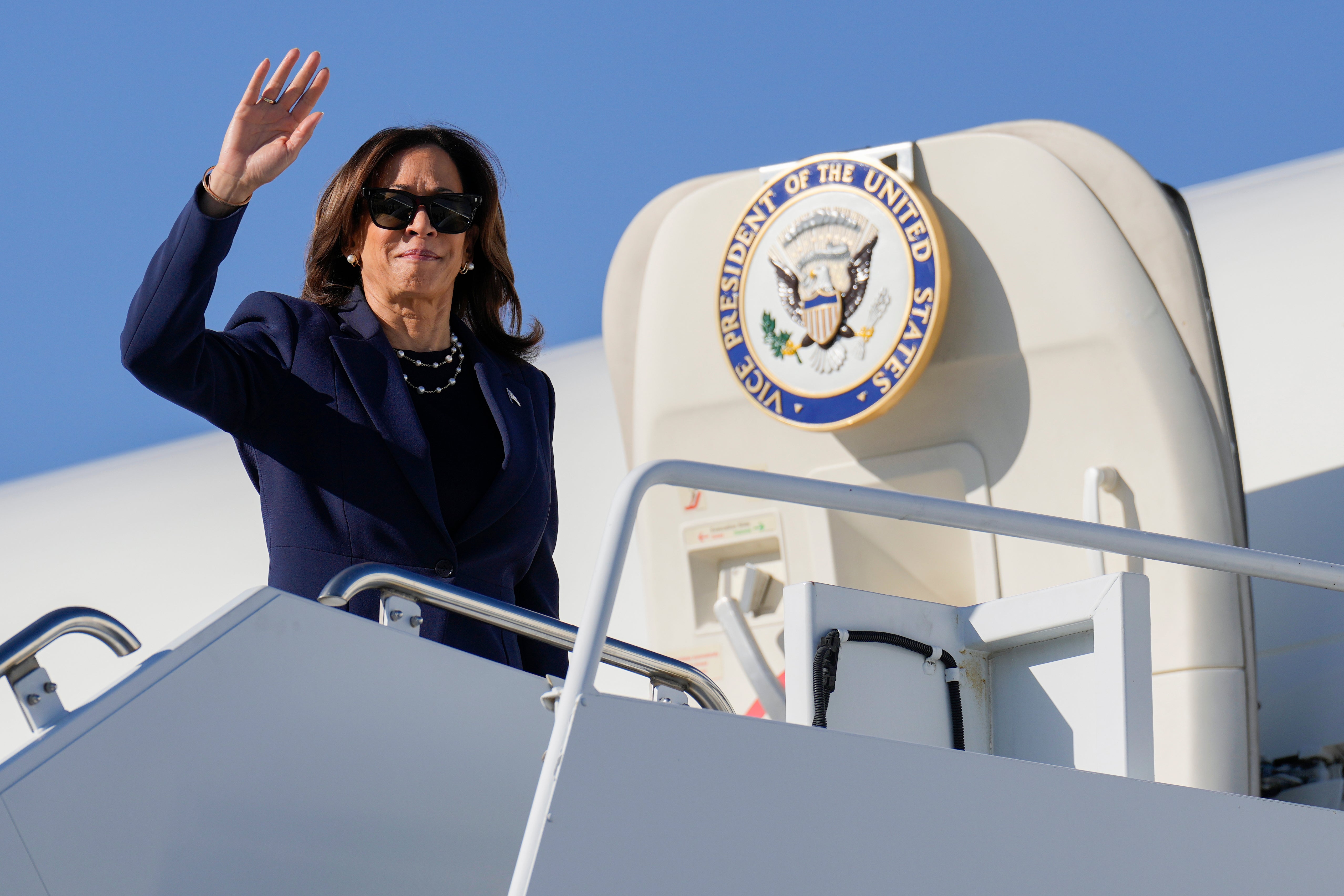 Democratic presidential nominee Vice President Kamala Harris boards Air Force Two in Las Vegas, Monday, Sept. 30, 2024, en route to Washington.