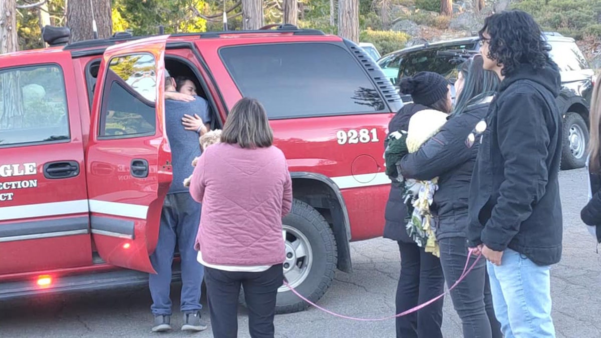 Teen hiker reunited with family