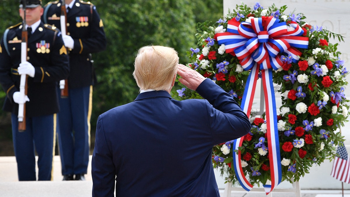 Former President Donald Trump with military wreath at Arlington National Cemetery