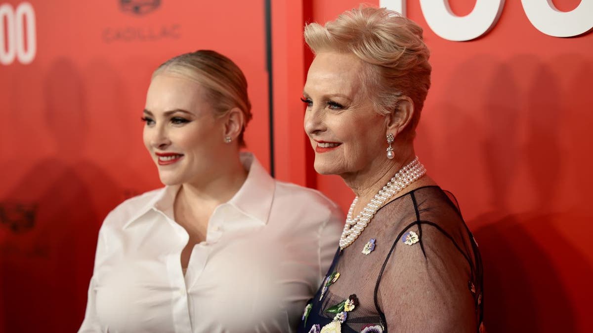 Meghan and mother smiling