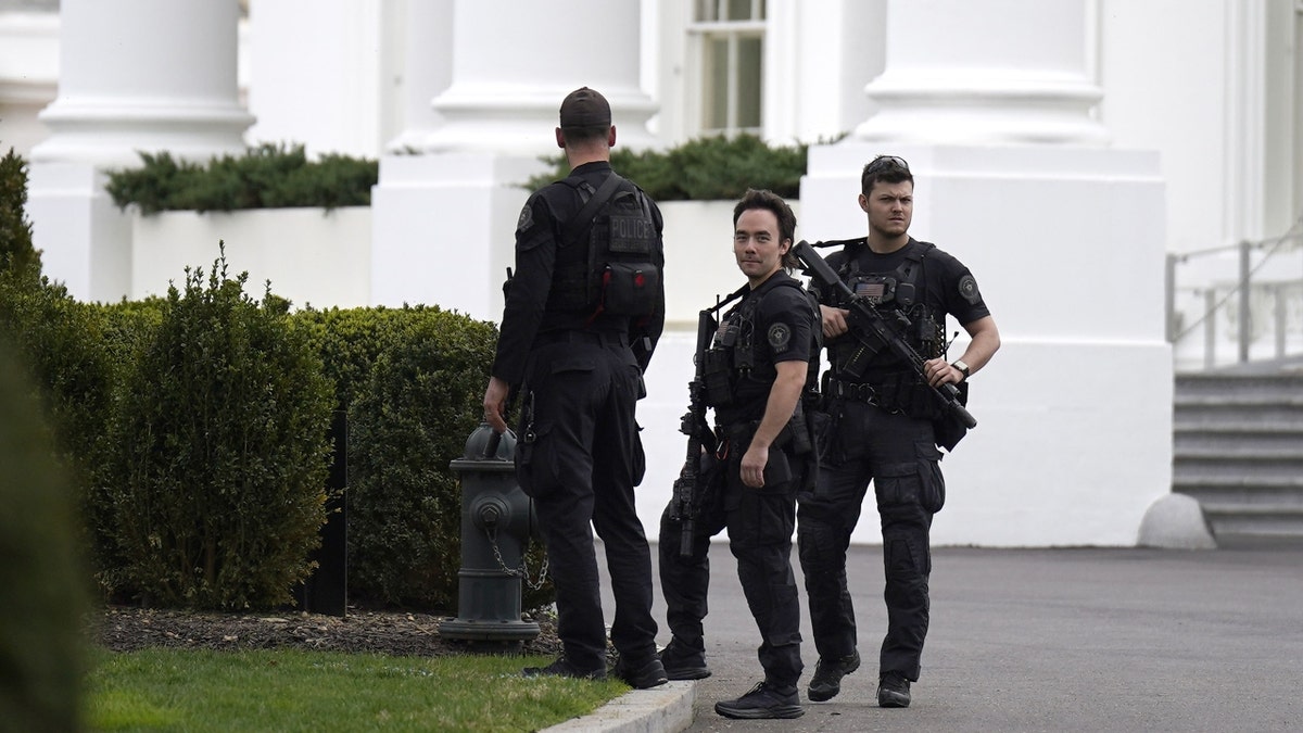 US Secret Service as Taoiseach Leo Varadkar speaks to the media after his bilateral meeting with US President Joe Biden at the White House in Washington, DC, during his visit to the US for St Patrick's Day. Picture date: Friday March 15, 2024.