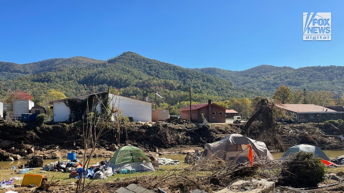 Tents on Dara Cody's former property along the Swannanoa River