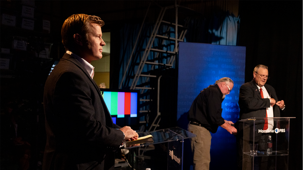 Tim Sheehy, left, prepares to debate U.S. Sen. Jon Tester, right, on campus at the University of Montana in Missoula, Mont., Monday, Sept. 30, 2024.