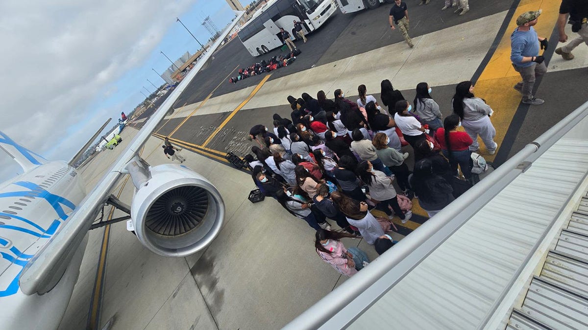 Migrants at a San Diego airport