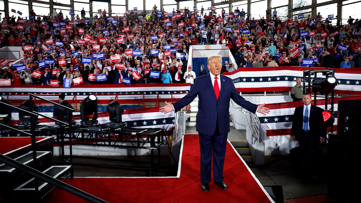 Republican presidential nominee, former President Donald Trump takes the stage during a campaign rally at the J.S. Dorton Arena on November 04, 2024 in Raleigh, North Carolina.  (Photo by Chip Somodevilla/Getty Images)