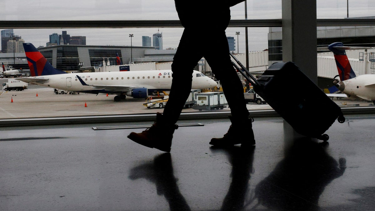 People walking through airport