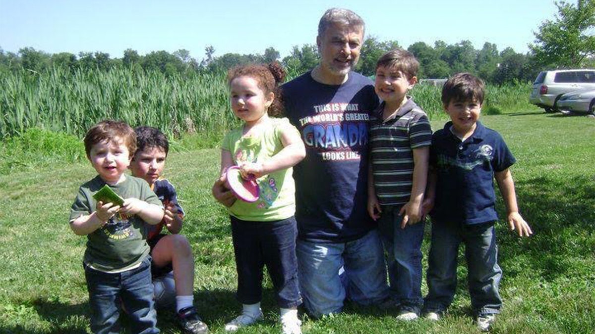 Majd Kamalmaz with his grandchildren.