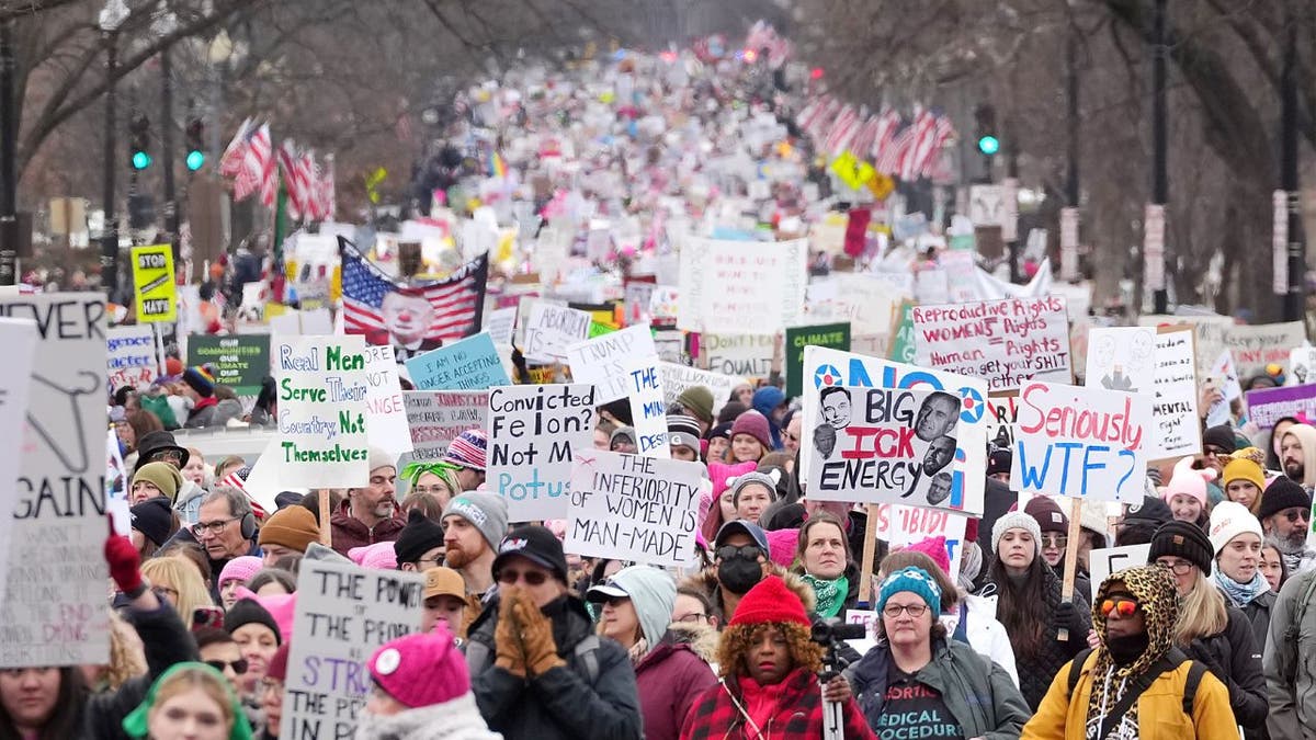 Demonstrators participate in the "People's March